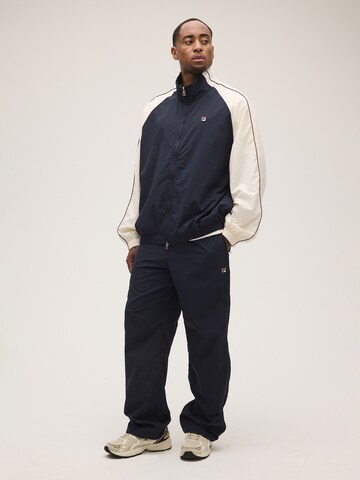 FILA - Loosefit Pantalón 'COLLALBO relaxed woven track pant' en azul