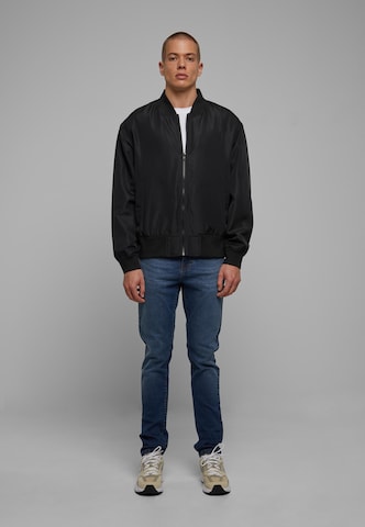 Veste mi-saison Urban Classics en noir