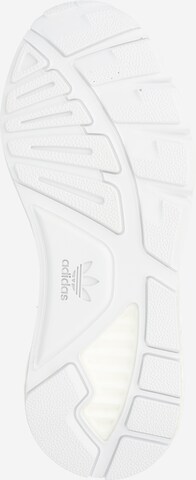 Chaussure de course ADIDAS ORIGINALS en blanc