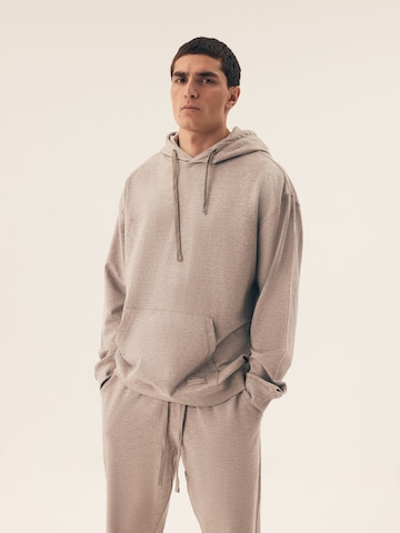 Felpa 'Kapuzensweatshirt Motion, French Terry, mit Rippbündchen' di Henderson in grigio: frontale