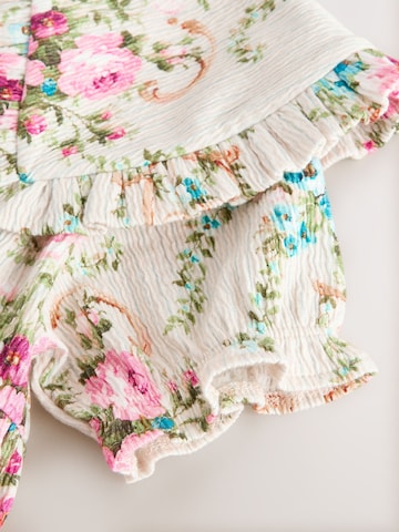 Rochie de la Next pe bej