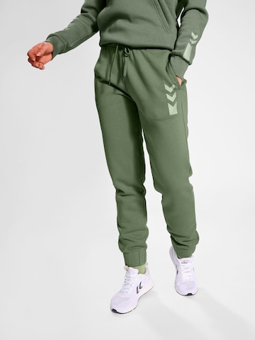 Hummel Slim fit Workout Pants in Green: front