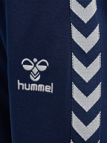 Effilé Pantalon de sport 'OLEK' Hummel en bleu