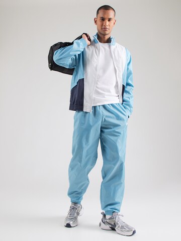 Nike Sportswear Joggingpak 'CLUB' in Blauw