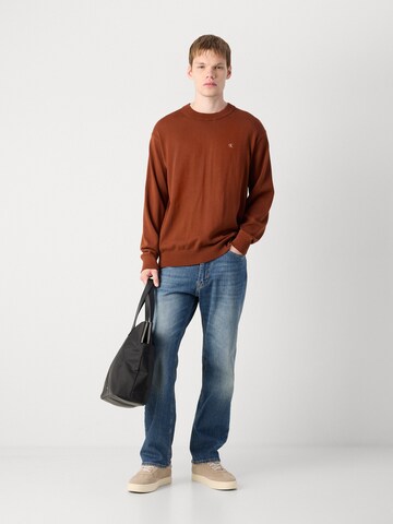 Pull-over Calvin Klein Jeans en rouge