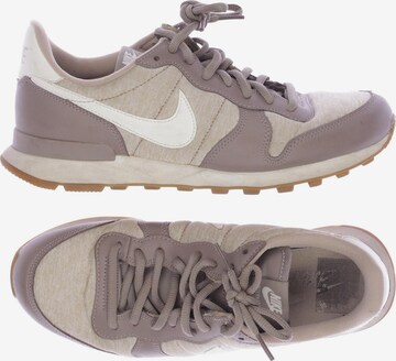 NIKE Sneakers & Trainers in 40 in Beige: front