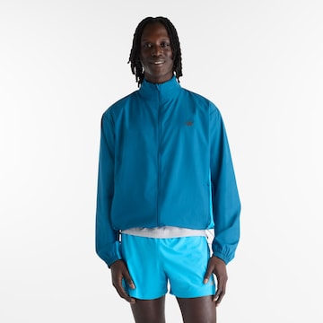 new balance - Chaqueta deportiva 'Fast Days Jacket' en azul: frente