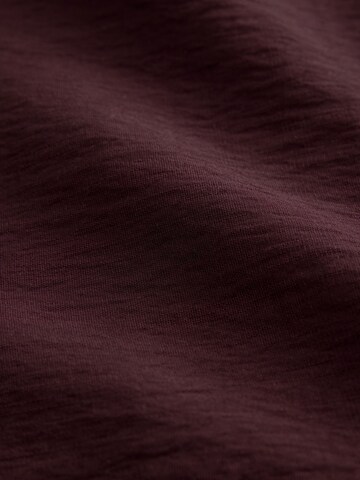 Combinaison Next en rouge