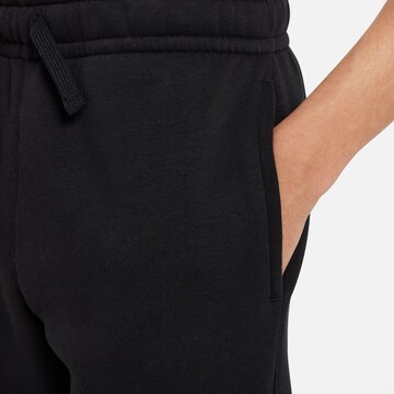 Effilé Pantalon Nike Sportswear en noir