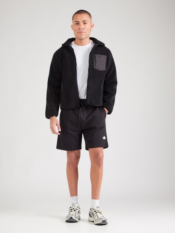 juoda THE NORTH FACE Standartinis Kelnės 'SIMPLE DOME'