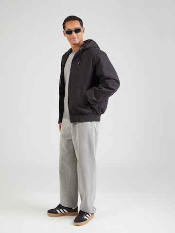 Superdry Демисезонная куртка 'Surplus' в Черный