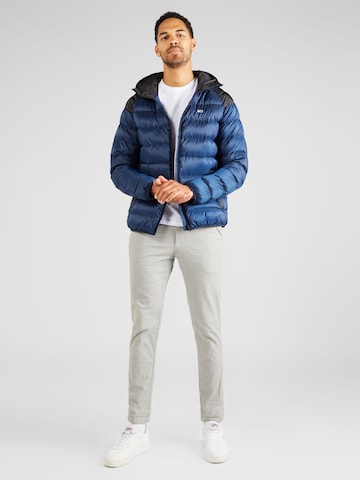 Tommy Jeans Winterjas in Blauw