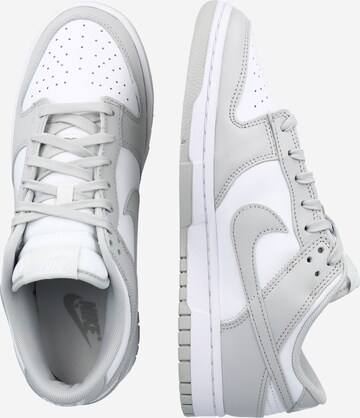 Baskets basses 'DUNK LOW RETRO' Nike Sportswear en blanc