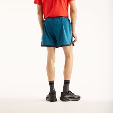 new balance Loosefit Sportbroek 'RC Essential' in Blauw