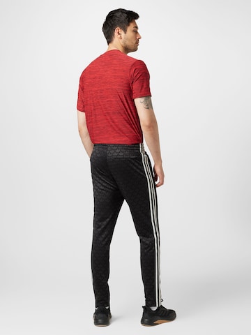 Regular Pantaloni 'Adicolor 70S Monogram' de la ADIDAS ORIGINALS pe negru