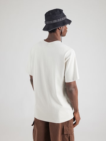 Maglietta 'ESS' di Nike Sportswear in beige