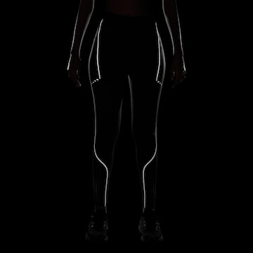 NIKE Skinny Leggings 'SWIFT TFADV' in Schwarz