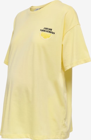 Only Maternity Koszulka w kolorze żółty: przód