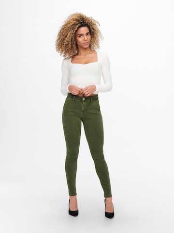 Skinny Jeans 'Blush' di ONLY in verde