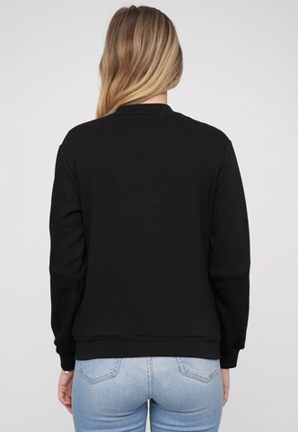 Cloud5ive Tussenjas in Zwart