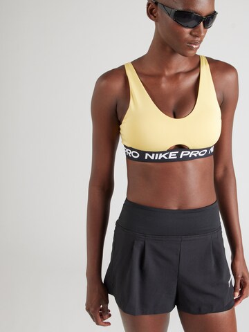 NIKE Μπουστάκι Αθλητικό σουτιέν 'Pro Indy' σε κίτρινο: μπροστά