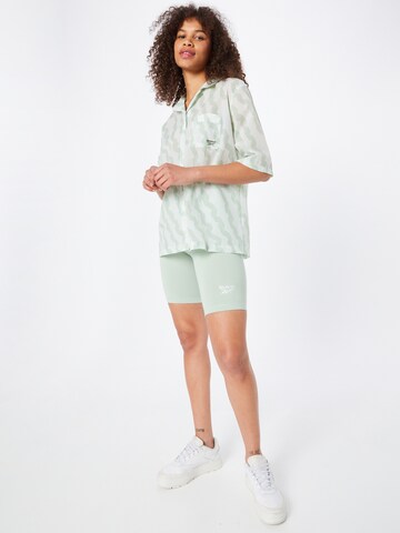 Reebok - Blusa en verde