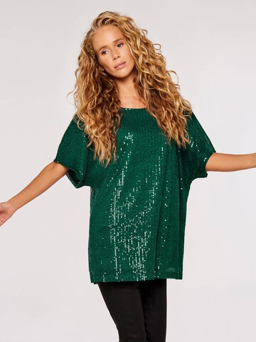 Haut Apricot en vert