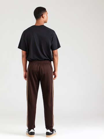 Tapered Pantaloni 'SST' de la ADIDAS ORIGINALS pe maro