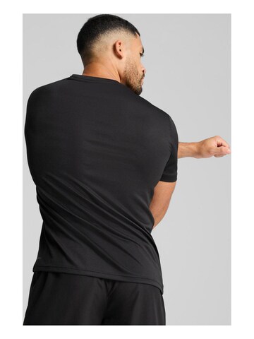 PUMA Shirt‌‌‌‌‌‌‌‌‌‌ in Schwarz