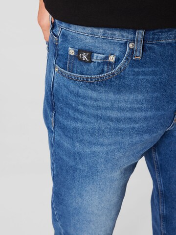 Calvin Klein Jeans Tapered Jeans i blå