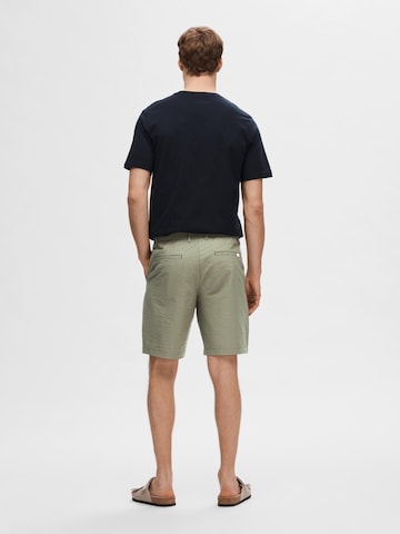 Regular Pantalon chino 'SLHKarl' SELECTED en vert