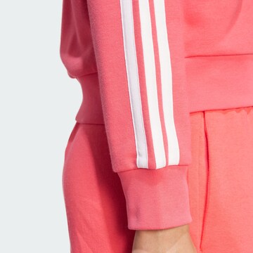 ADIDAS SPORTSWEAR Αθλητική ζακέτα φούτερ 'Essentials' σε ροζ