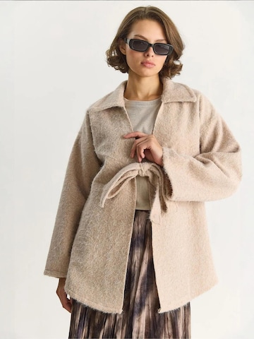 Cardigan Bianco Lucci en beige