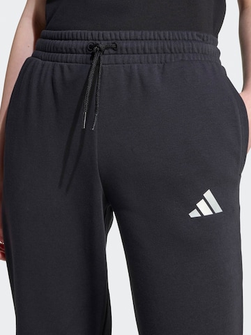 Bootcut Pantalon de sport ADIDAS SPORTSWEAR en noir