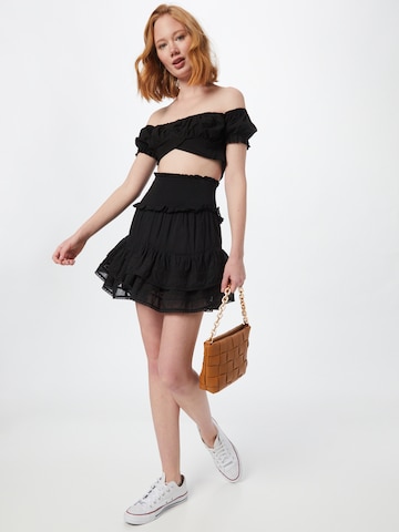 melns Femme Luxe T-Krekls 'CHLOE'