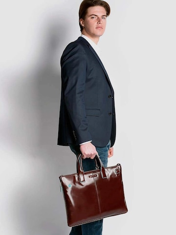 Sac d’ordinateur portable Piquadro en rouge