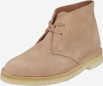 Clarks Originals Lace-Up Ankle Boots in Beige: front