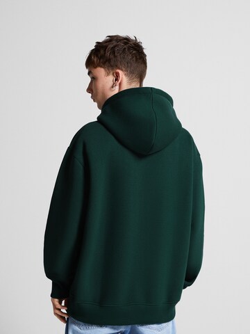 Bluză de molton de la Bershka pe verde