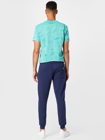 Tommy Jeans Tapered Hose in Blau