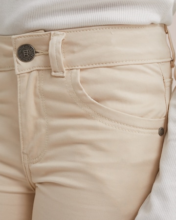 WE Fashion Flared Trousers in Beige