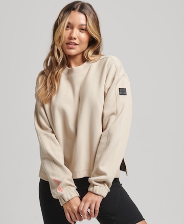 Sweat-shirt Superdry en beige : devant