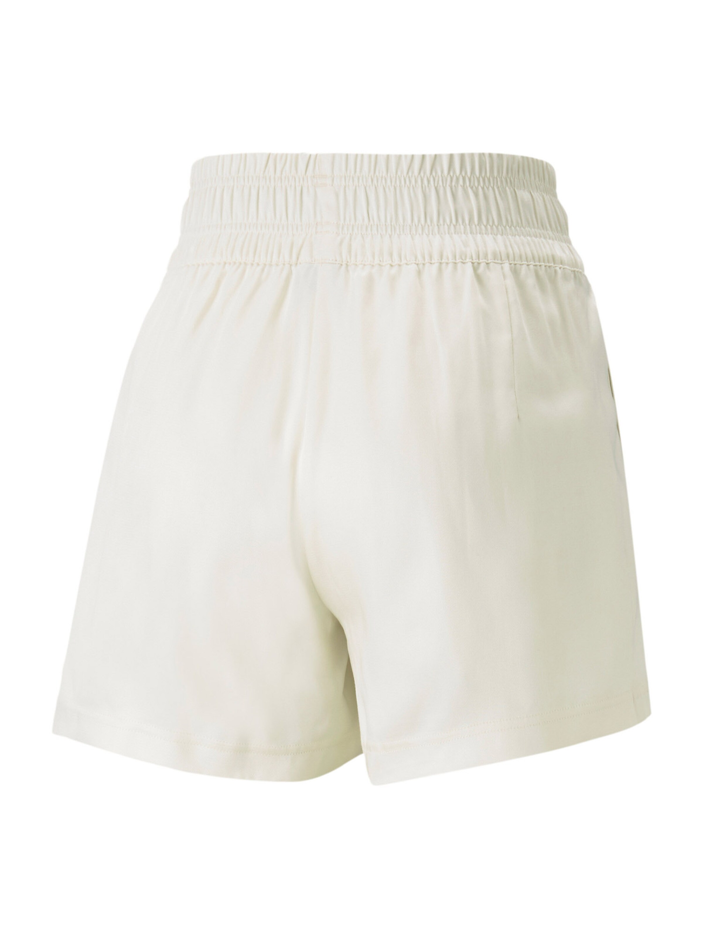 PUMA Loosefit Housut 'T7' värissä beige