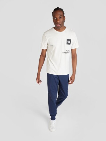 T-Shirt fonctionnel THE NORTH FACE en blanc