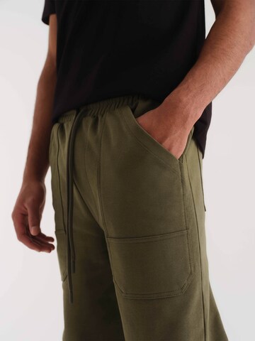 ABOUT YOU x Kevin Trapp Regular Trousers 'Jonathan' in Green