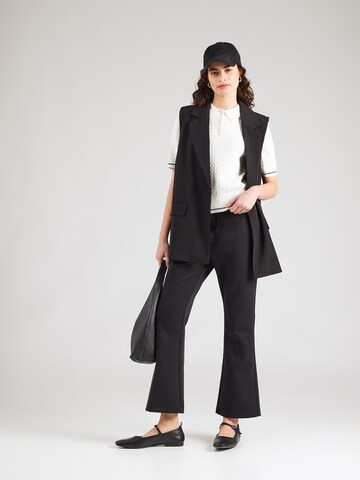 Evazați Pantaloni de la Calvin Klein pe negru