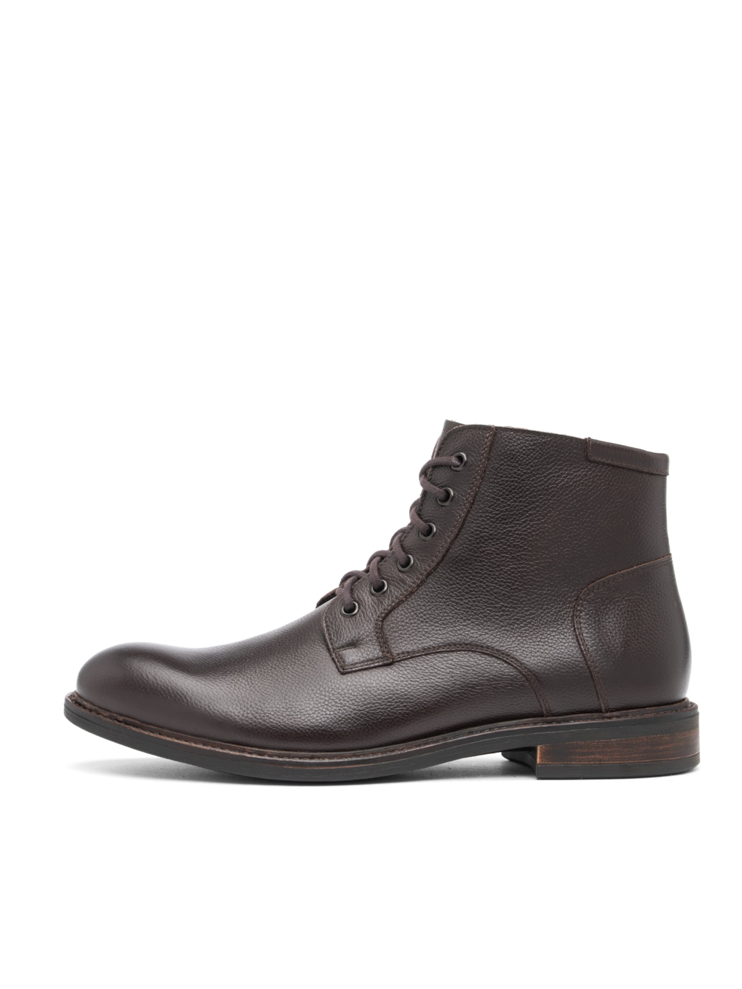 Boots stringati di RYŁKO in marrone: frontale
