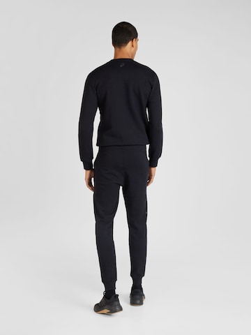 ASICS Tapered Sportbroek in Zwart