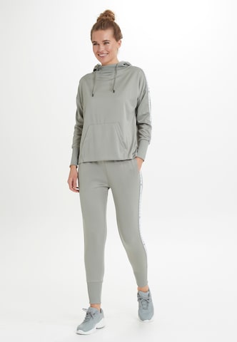 Athlecia Slim fit Workout Pants 'Sella' in Grey