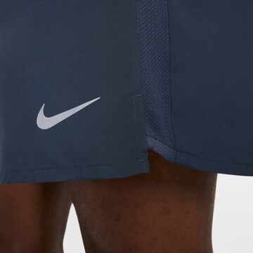NIKE Regular Workout Pants in Blue
