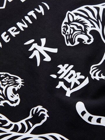Tricou 'JJBOYE' de la JACK & JONES pe negru